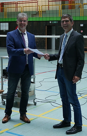 Übergabe der Urkunde, Ullrich Müller und Holger Leinweber